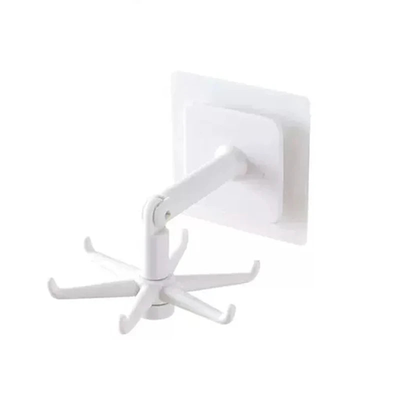 Rotatable wall mounted spoon and spatula hanger with utensils, front view