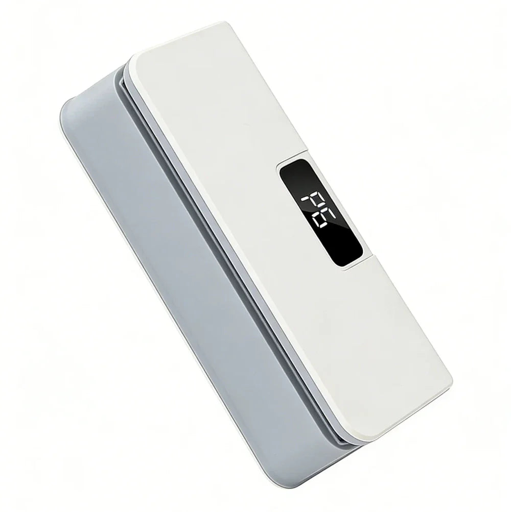 Rechargeable bag sealer shown with USB charging cable