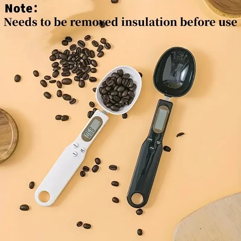 Digital measuring spoon scale displaying weight on LCD screen