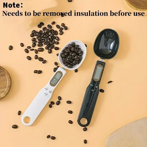 Digital measuring spoon scale displaying weight on LCD screen