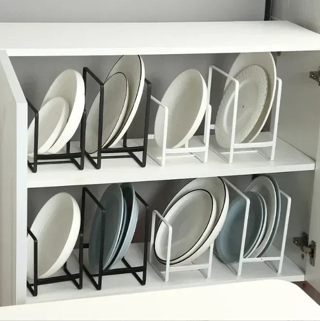 Stackable plate rack organizing pans and cutting boards in a cabinet