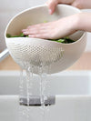 Rice washing drain basket used as a vegetable colander