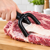 Close-up trimming a beef brisket