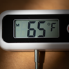 Close-up of meat thermometer LCD display showing temperature reading