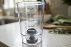 Adjustable Measuring Cup with Push-Up Base for Sticky Ingredients