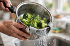 Clip-On Silicone Pot Strainer - Snap-On Pasta and Veggie Drainer - draining steamed broccoli