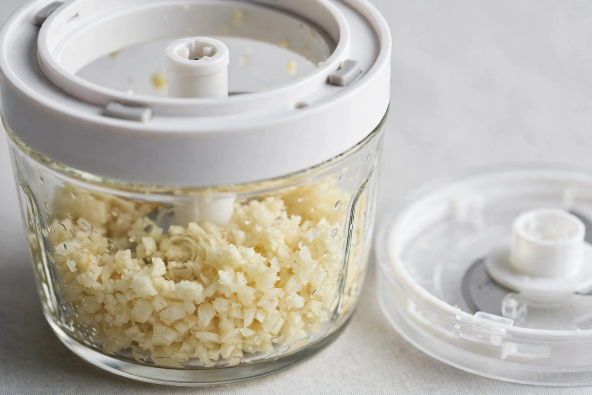 USB Rechargeable Mini Food Chopper - Electric - freshly minced garlic close-up