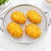 Overhead close-up of crispy food in basket